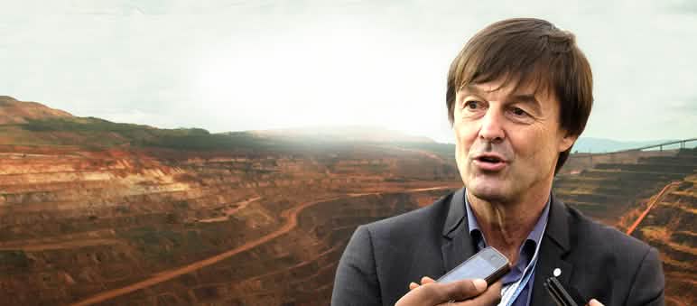 Photomontage : Nicolas Hulot avec en arrière plan un exemple de mine industrielle
